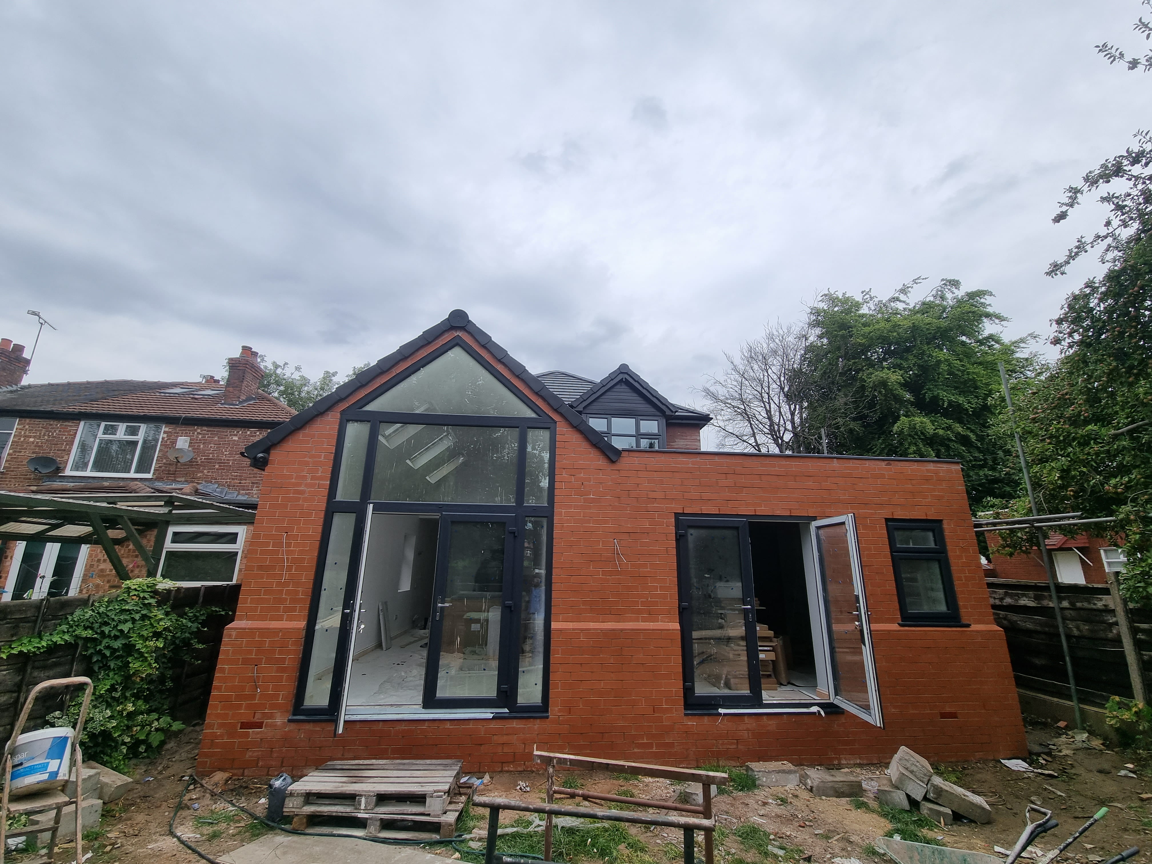 Completed house extension by KWS Builders in Manchester, front elevation